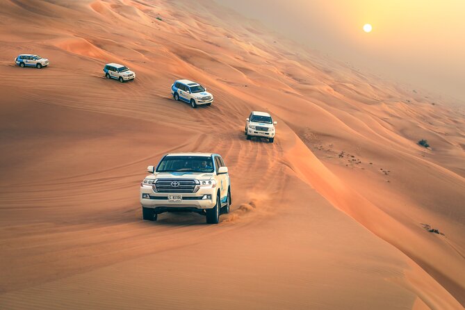Dubai 4x4 Desert Safari, Quad Bike, Camel Ride & BBQ Dinner - Conquer the Dunes With an Exciting Quad Bike Ride