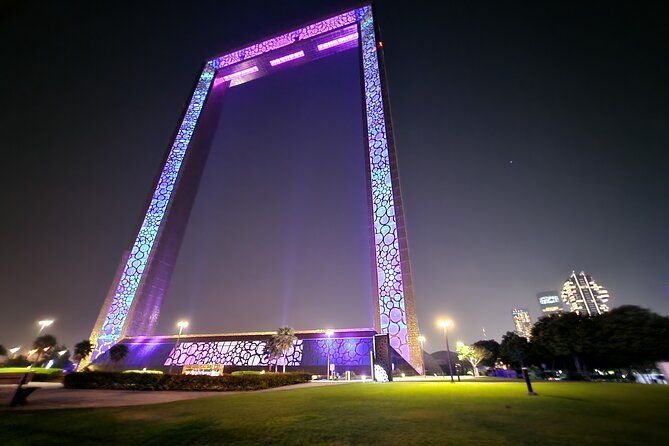 Dubai After Dark City Highlights With Dinner, Guide and Transfer - Guided Tour of Dubais Evening Attractions