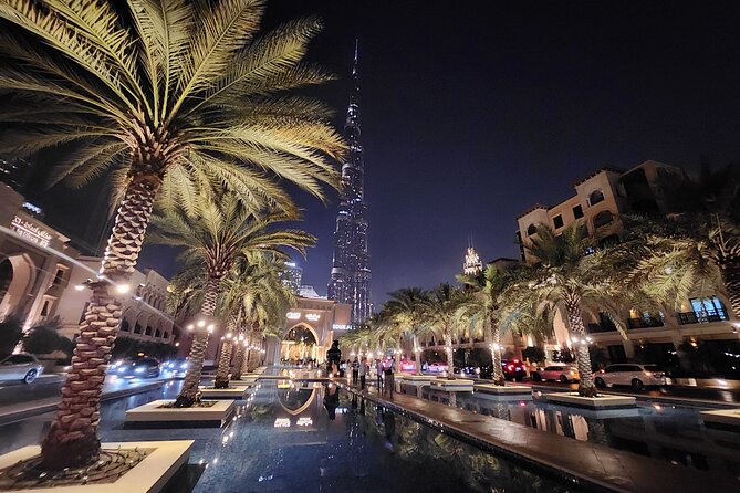 Dubai After Dark City Highlights With Dinner, Guide and Transfer - Hassle-Free Transfer Service Included