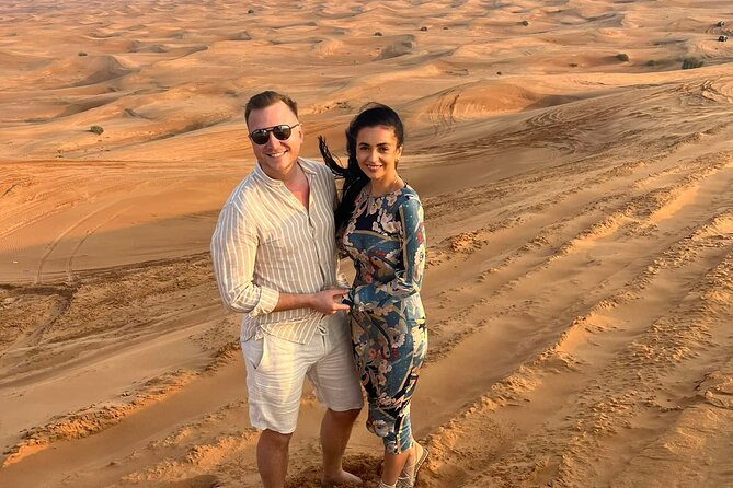 Dubai Anytime Short Desert Visit With Camel and Sandboarding - Camel Ride and Interaction