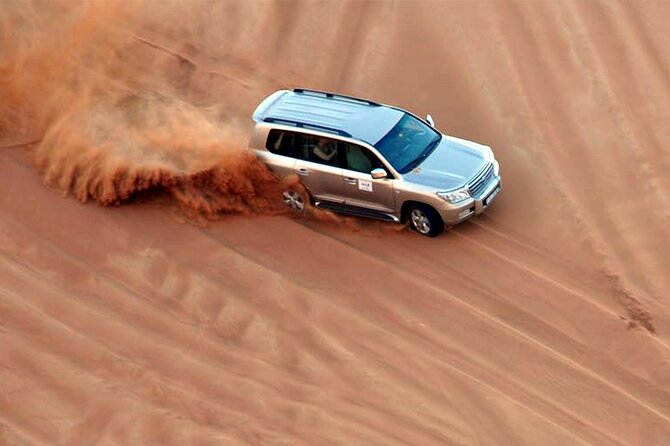 Dubai Camel Riding Sandboarding and Dune Bashing Experience - Dubai Desert Adventure: Dune Bashing