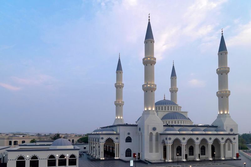Dubai City Tour with Blue Mosque Visit & Al Khayma Heritage House - An abra ride across Dubai Creek