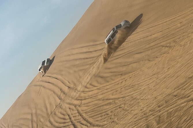 Dubai Desert 4x4 With BBQ, Dune Bashing, Camel Ride, Show - The Sum Up
