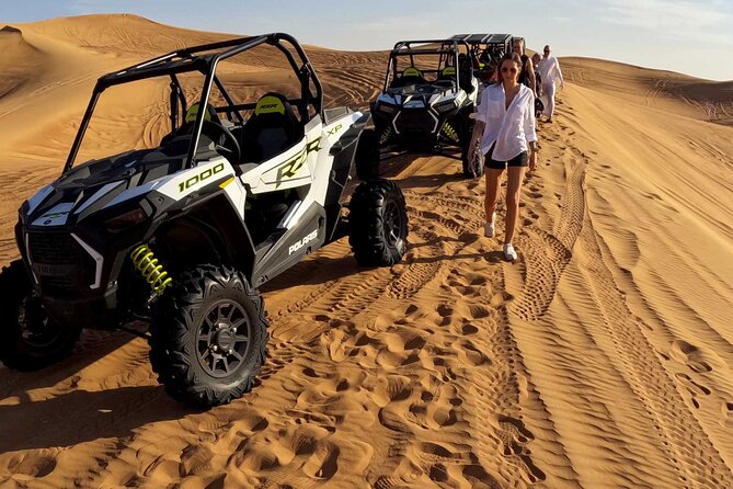 Dubai Desert Dune Buggy Ride, Sand Boarding, BBQ Dinner Camp - The Sum Up