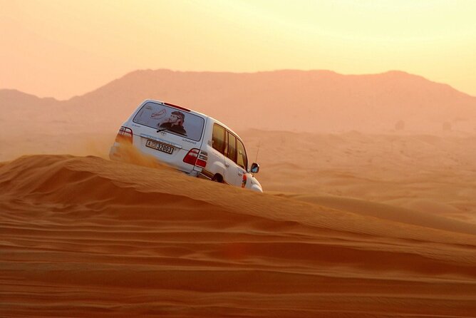 Dubai Desert Safari & BBQ Dinner With Live Belly Dance,Fire Show, Tanura Show - Small-Group Tour Highlights