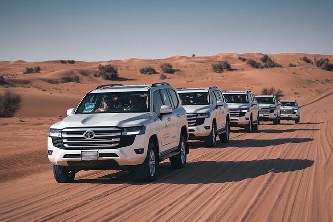 Dubai Desert Safari: Camel Ride, Sandboarding, BBQ & Spirits - Indulge in a Delicious BBQ Feast
