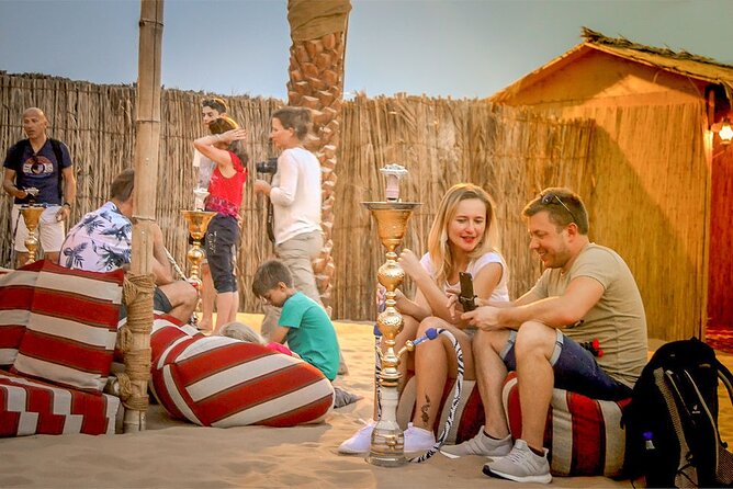 Dubai Desert Safari Dune Bashing, Camel Ride, Sand Boarding, BBQ Dinner. - Cultural Experiences: Henna Painting and Live Shows