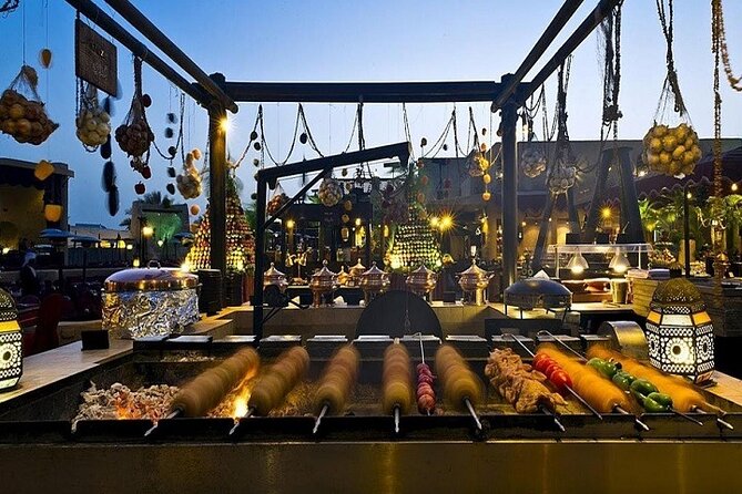 Dubai Desert Safari Red Dune: BBQ, Camel Ride & Sandboarding - Booking Confirmation and Travel Details