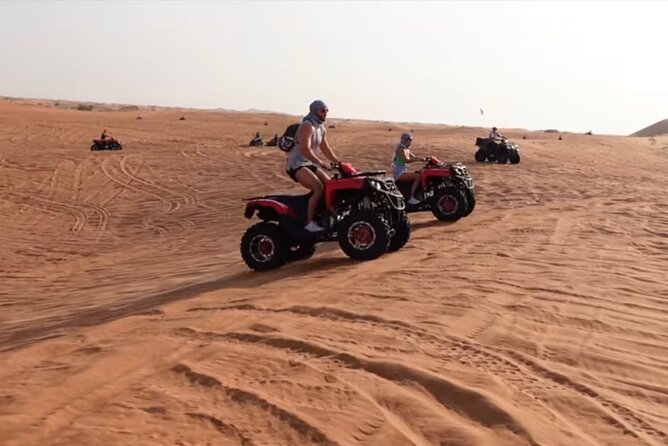 Dubai Desert Safari, Sand-boarding, Camel Ride, Veg & BBQ Dinner - Sand-boarding Adventure in the Desert