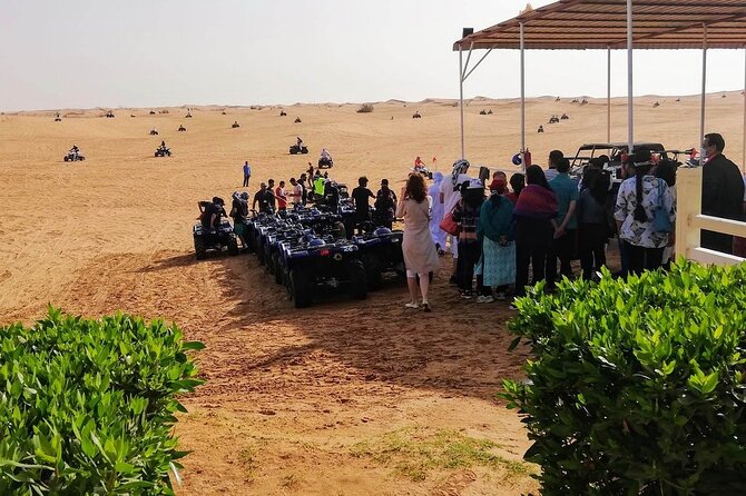 Dubai Desert Safari: Tanoura Show, Dune Bashing and BBQ Dinner - Exciting Activities: Sandboarding and Camel Ride