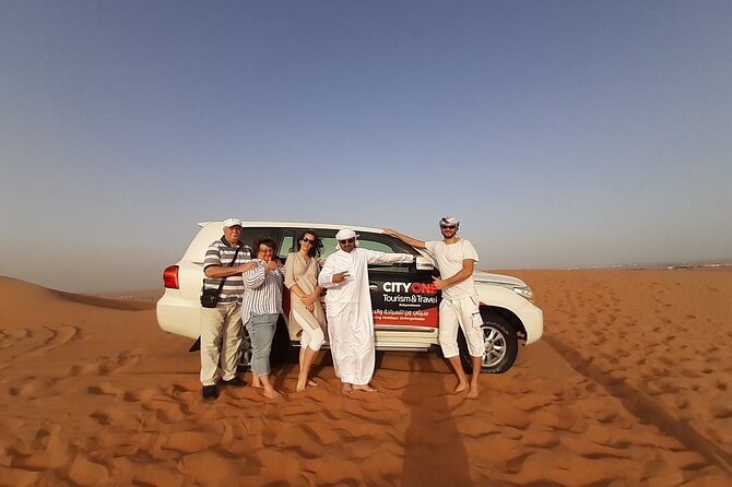 Dubai Desert Safari: Tanoura Show, Dune Bashing and BBQ Dinner - Experience Traditional Henna Tattoo