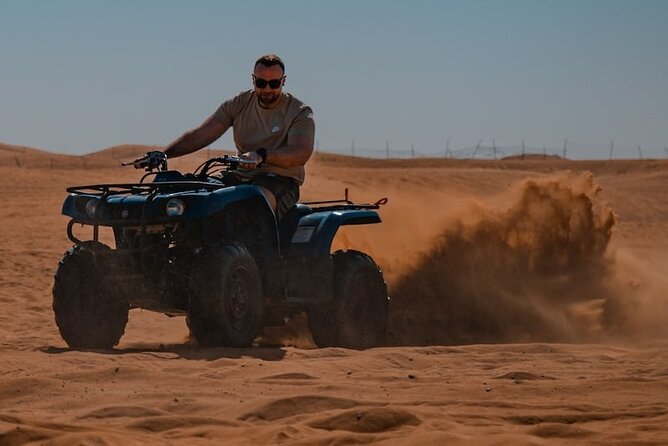 Dubai Desert Safari Tour With BBQ Dinner Quide Bike & Camel Ride - The Sum Up