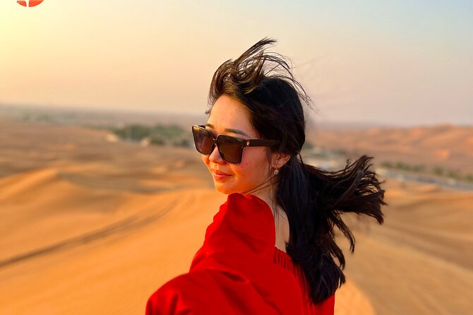 Dubai Desert Safari With 4x4 Dune Bashing,Camel Ride Sand Board - Capture Stunning Sunset Photos Against the Dunes