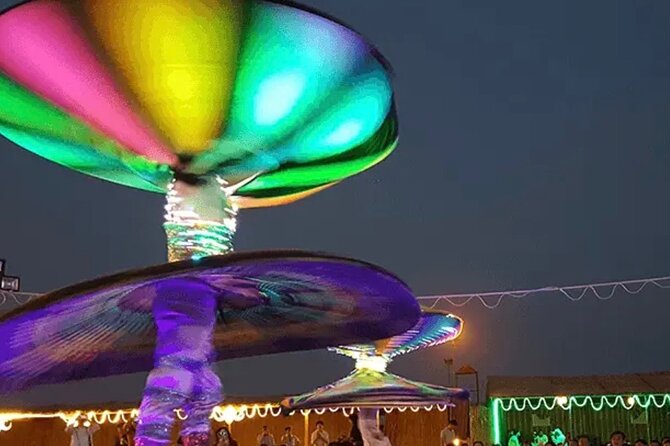 Dubai Desert Safari With 4x4 Dune Bashing,Camel Ride Sand Board - Be Entertained With Belly Dance and Fire Performances