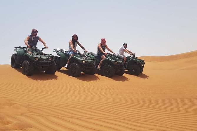 Dubai Desert Safari With ATV Drive, Camel Ride and BBQ Dinner - Pricing and Booking Details