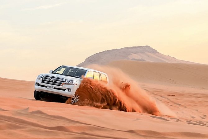 Dubai Desert Safari With ATV, Dune Bash, Camel Ride and BBQ - Exciting Activities: ATV, Dune Bashing, Camel Ride, and Sandboarding