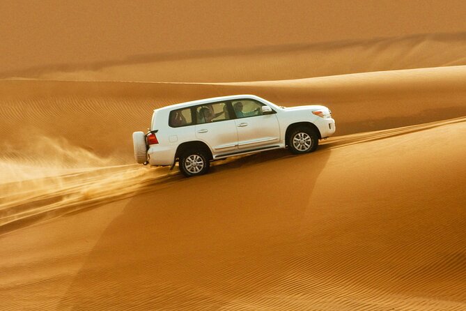 Dubai Desert Safari With BBQ Dinner, Dune Bashing & Live Show - Visit to a Traditional Emirati Bedouin Camp