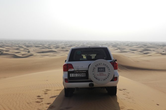 Dubai Desert Safari With Camel Ride and Barbeque Dinner - Sunset Views and Barbeque Dinner