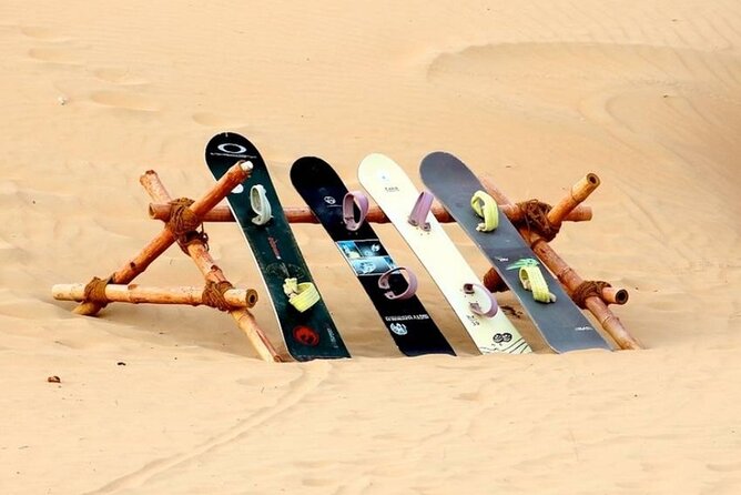 Dubai Desert Safari With Camel Riding, Sand Boarding,BBQ Dinner and 3 Live Shows - Camel Riding and Sandboarding