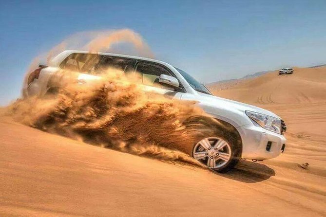 Dubai Desert Safari With Dune Bash, Camel Ride, BBQ and Shows - Pickup Details and Cancellation Policy