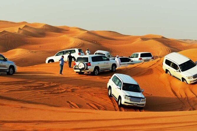 Dubai Desert Safari With Live Show, BBQ Dinner, Camel Ride & Sand Board Options - Pricing and Packages