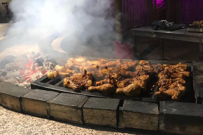 Dubai Desert Small-Group Tour With Camel Ride and Dinner - Dune Bashing and Sunset Photo Stops