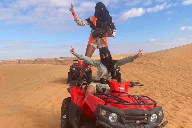 Dubai Dinner Desert Experience With 01 Hour Quad Bike and Camel Ride - Dining and Entertainment