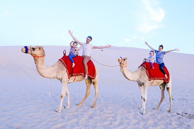Dubai Evening Desert Safari - Camel Riding and Sandboarding
