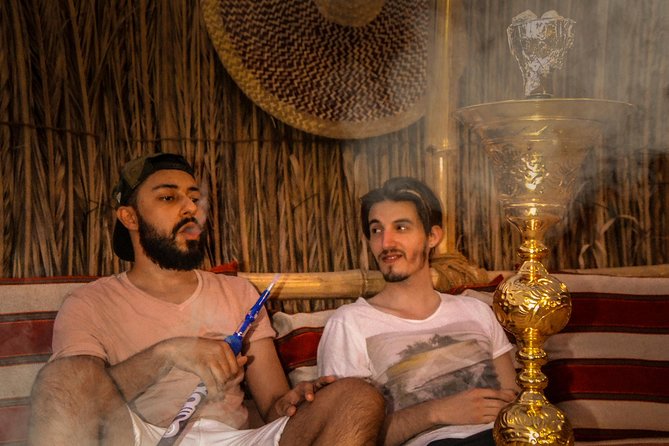 Dubai Evening Desert Safari, Camel Ride, Sandboarding & BBQ Dinner - The Sum Up