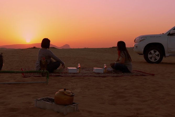 Dubai Fossil Rocks Desert Half-Day Safari With Camel Ride, BBQ - Arabic Coffee and Dates Experience