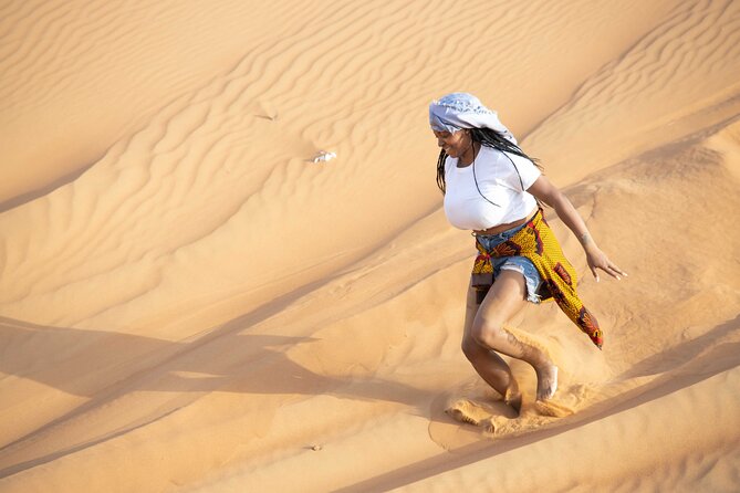 Dubai Half-Day Red Dunes Bashing With Sandboarding, Camel &Falcon - Discover the Beauty of Camel Riding