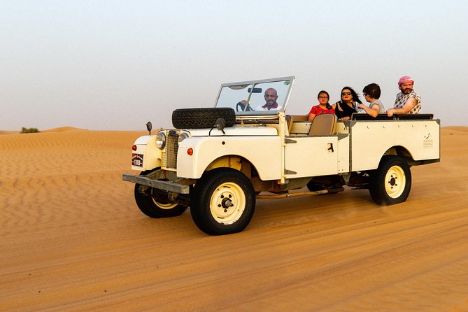 Dubai Heritage Land Rover Desert Safari With Traditional Dinner & Entertainment - Pricing and Booking Details