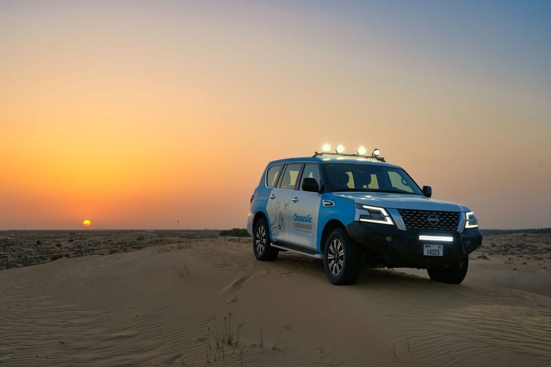 Dubai: Premium Night Desert Safari with Camel Ride & Stargazing - Stargazing through a telescope
