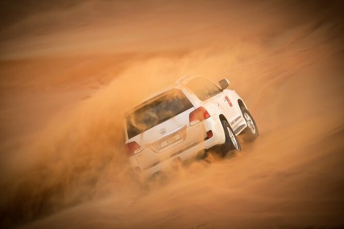 Dubai Red Dune Camel Trekking, Desert Safari and BBQ Dinner - Memorable Cultural Encounter in Dubais Desert