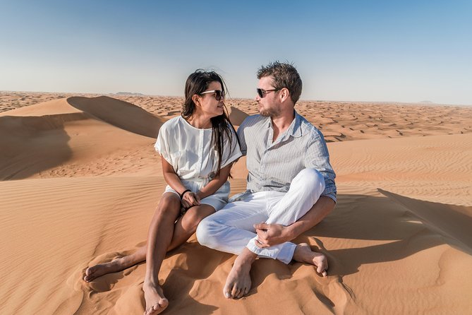 Dubai Red Dune Desert Safari: Camel Ride, Sandboarding & BBQ Options - Pricing and Booking Options