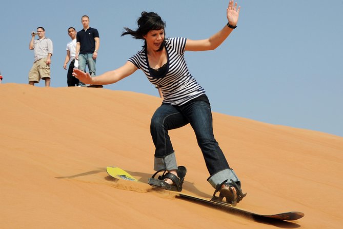 Dubai Red Dune Extreme Desert Safari Adventure With Sand Boarding - Thrilling Sandboarding and Dune Racing Experience