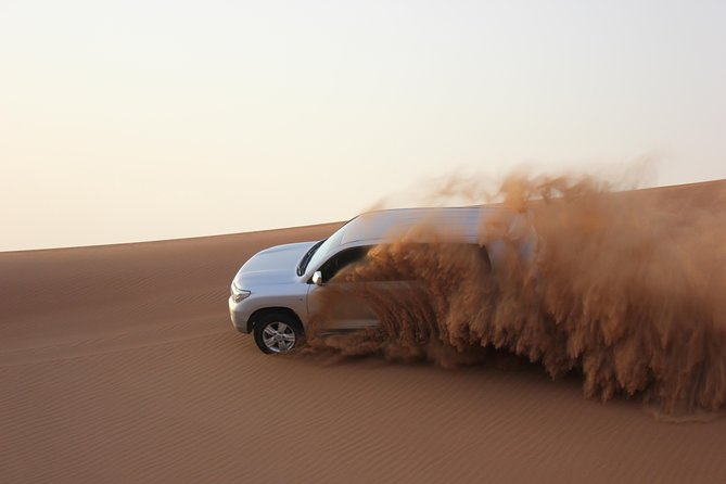 Dubai Red Dune Extreme Desert Safari Adventure With Sand Boarding - Learn More About Cancellations on the Website