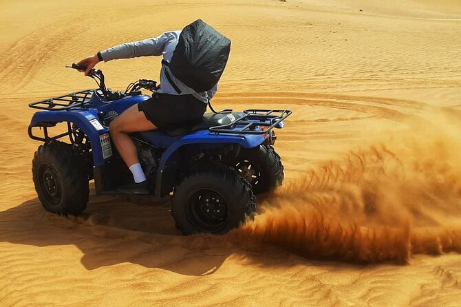 Dubai: Red Dune Quad Bike Desert Safari Adventure - Pricing and Booking