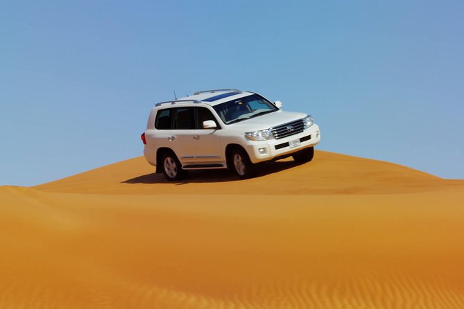 Dubai Red Dune Safari With BBQ Dinner & Live Shows From RAK - Full Repertoire of Desert Activities