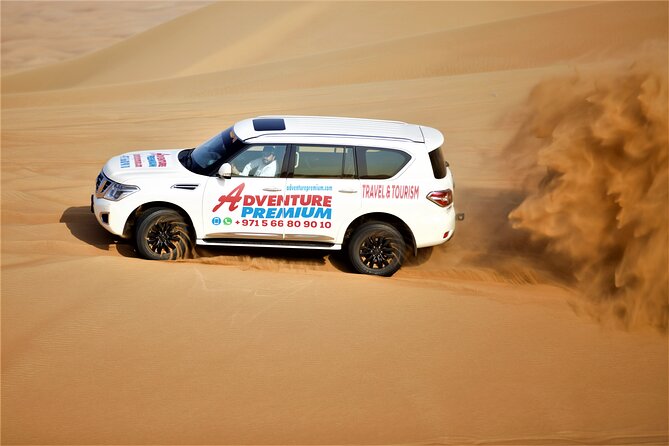 Dubai Red Dunes Camel Safari With Sand Boarding, Dune Bashing & BBQ - The Sum Up