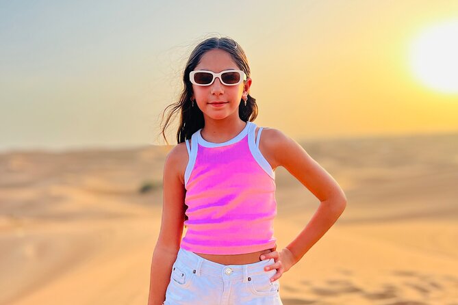 Dubai : Red Dunes ,Camel ,Sandsurf , Sunset & Premium Dinner - Entertainment: Fire Show, Belly Dancing, and Tanura