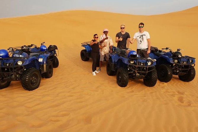 Dubai Red Dunes Desert ATV Drive, Sandboard and Camel Safari - Unforgettable Camelback Ride Experience