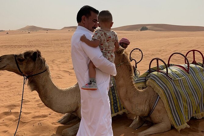 Dubai Red Dunes Desert ATV Drive, Sandboard and Camel Safari - The Sum Up