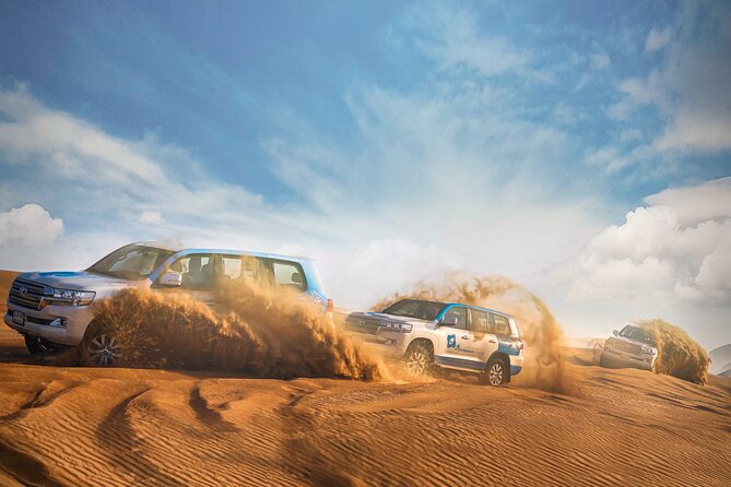 Dubai: Red Dunes Desert Safari, Sandsurf, Camels & Quad Bike Option - Inclusions and Pickup Details