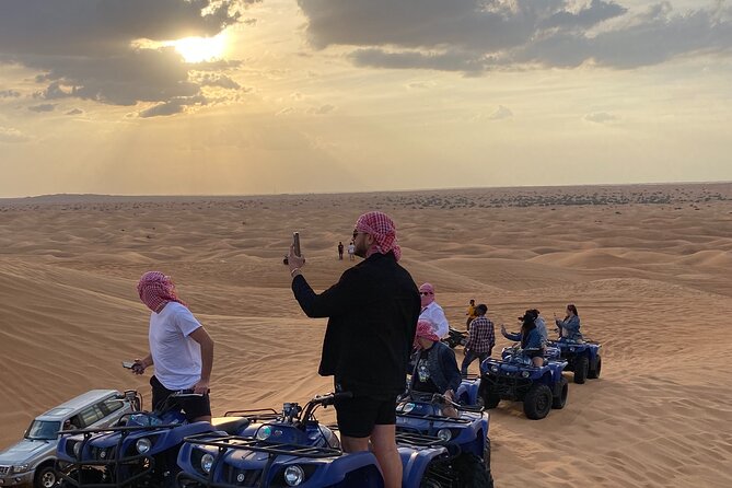 Dubai Red Dunes Quad Bike Safari, Camels, Sandsurf & Refreshment - Sandsurf: Conquer the Red Dunes on a Board