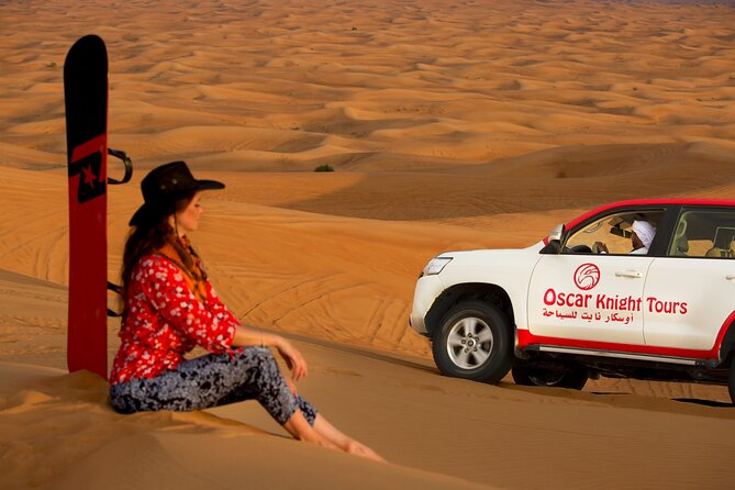 Dubai Sunset Desert Safari With Dinner - Tour Experience: Evening Safari, Dune Bashing, Sandboarding, Sunset Viewing, Camel Ride, Cultural Activities