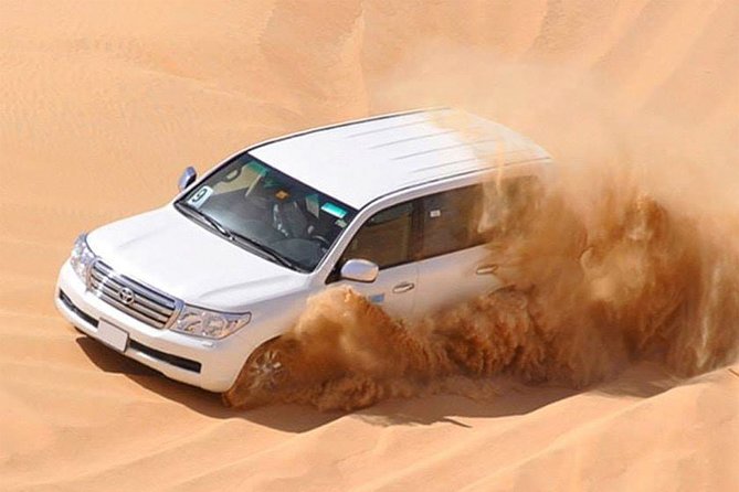 Dubai Sunset Desert Tour: Sandboarding, Dune-Bashing & Dinner - Unforgettable Evening in Dubai Desert