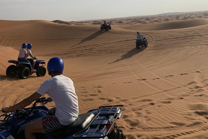 Dubai: Unique SUNSET Quad Bike Red Dunes Safari - Cancellation Policy