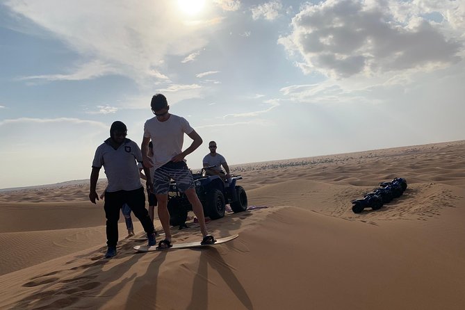 Dubai: Unique SUNSET Quad Bike Red Dunes Safari - The Sum Up