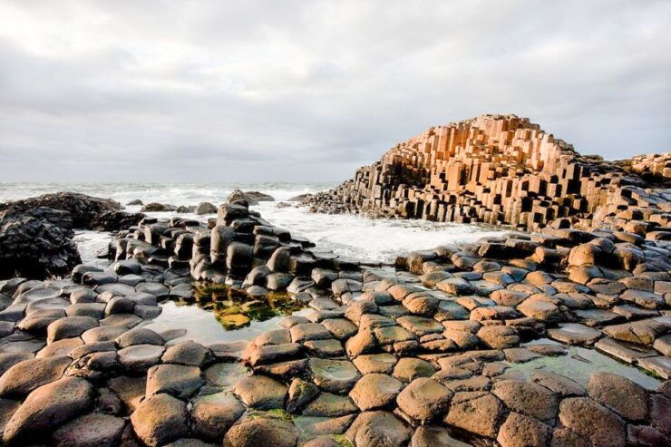 Dublin: Giants Causeway, Dark Hedges, Dunluce & Belfast Tour - Medieval Ruins of Dunluce Castle
